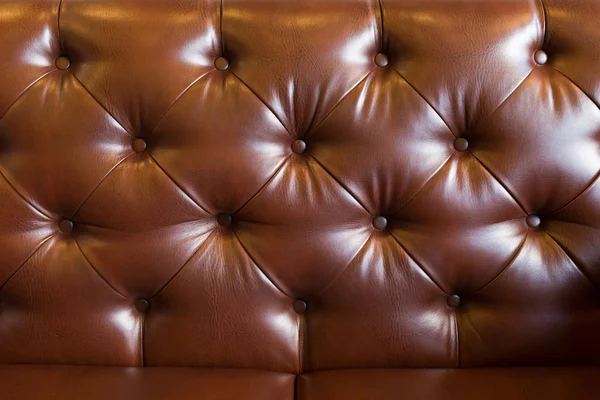 Lederpolster braunes Sofa Hintergrund für luxuriöse Dekoration — Stockfoto