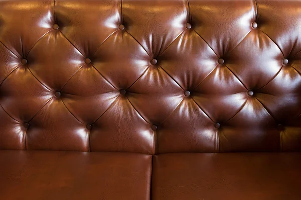 Läder klädsel brun soffa bakgrund för lyx dekoration — Stockfoto