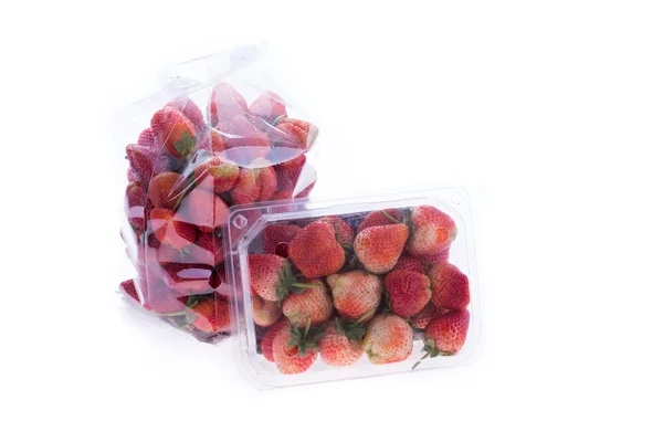 Strawberry juicy fruit in plastic bag packaging isolated — Stock Photo, Image