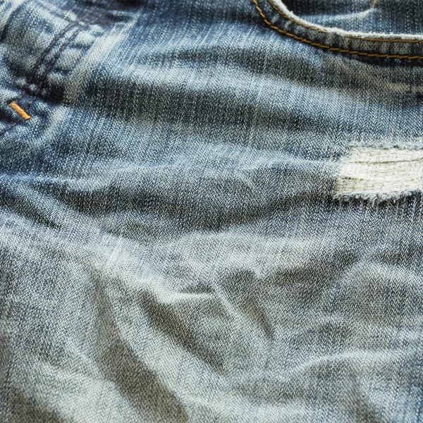 Denim ontwerp van mode jeans textiel achtergrond — Stockfoto