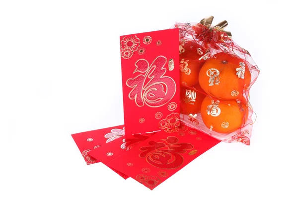 Sobre rojo y fruta naranja de la decoración del año nuevo chino — Foto de Stock