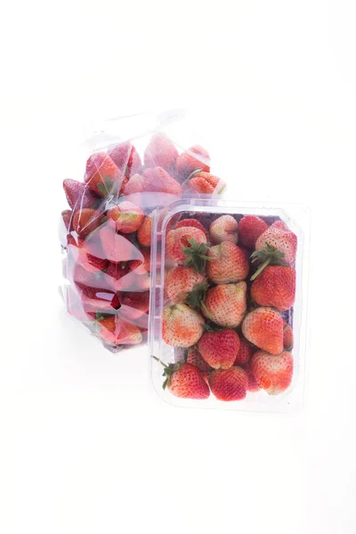 Strawberry juicy fruit in plastic bag packaging isolated — Stock Photo, Image