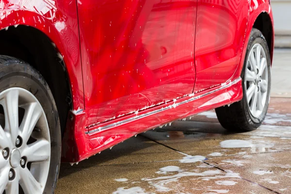 Car wash with soap, car cleaning service — Stock Photo, Image