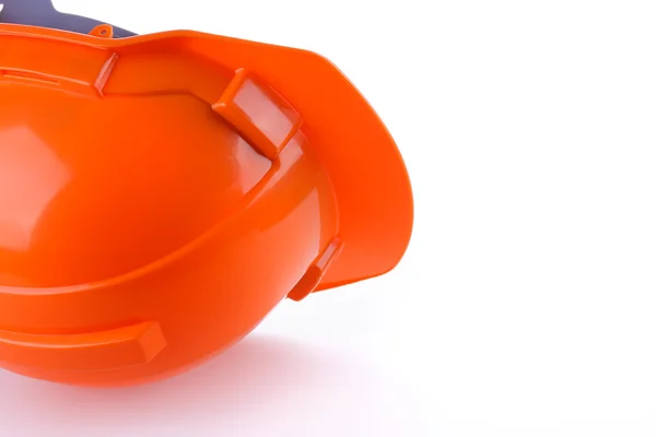 Orange safety helmet hard hat, tool protect worker of danger — Stock Photo, Image