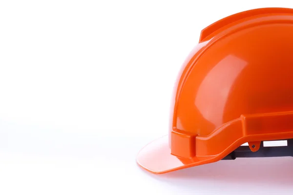 Casco di sicurezza arancione cappello rigido, strumento proteggere il lavoratore di pericolo — Foto Stock