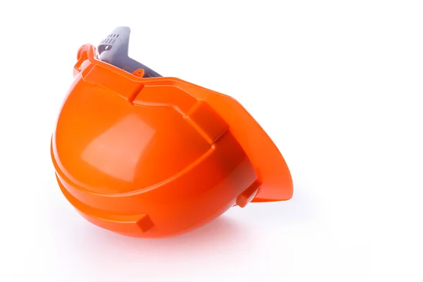 Casco de seguridad naranja casco duro, herramienta de proteger al trabajador del peligro — Foto de Stock