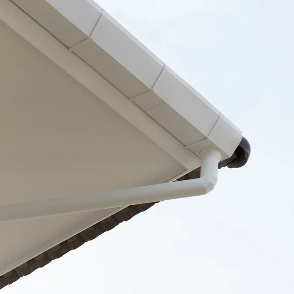 Gutter on the roof top of house — Stock Photo, Image