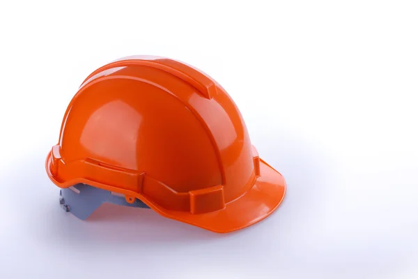 オレンジ安全ヘルメット ヘルメット、ツールは危険の労働者を保護します。 — ストック写真