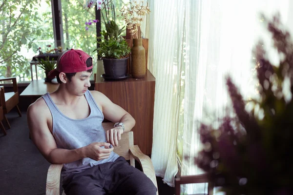 Man sitting waiting a person in coffee cafe, image used vintage — Stock Photo, Image