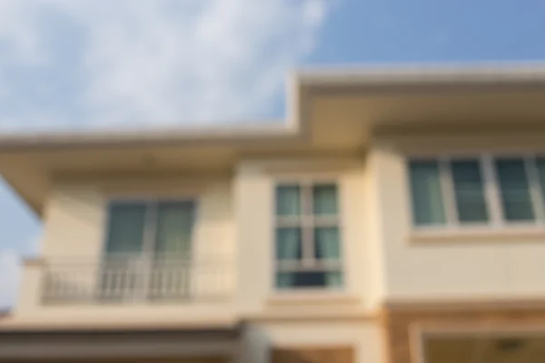 Casa grande de aldeia, imagem de fundo borrão — Fotografia de Stock