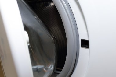 beyaz çamaşır makinesi temizlik ev işi ceketler