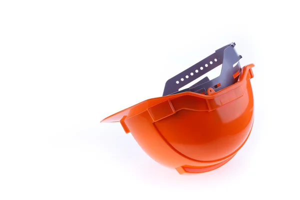 Casco de seguridad naranja casco duro, herramienta de proteger al trabajador del peligro — Foto de Stock