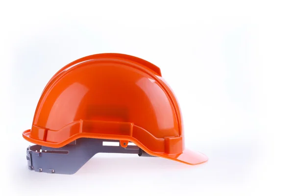 Casco de seguridad naranja casco duro, herramienta de proteger al trabajador del peligro — Foto de Stock