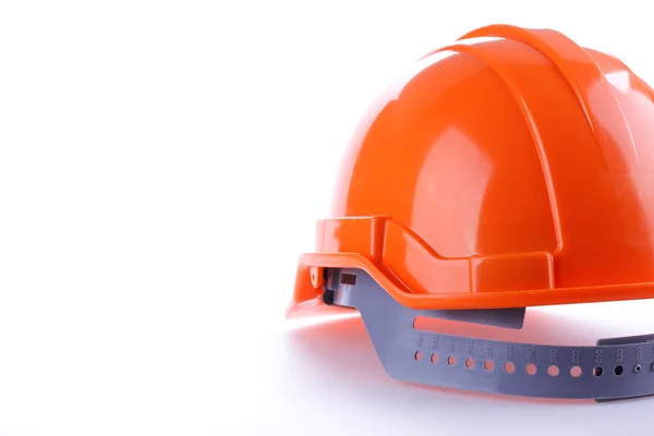 Casco di sicurezza arancione cappello rigido, strumento proteggere il lavoratore di pericolo — Foto Stock