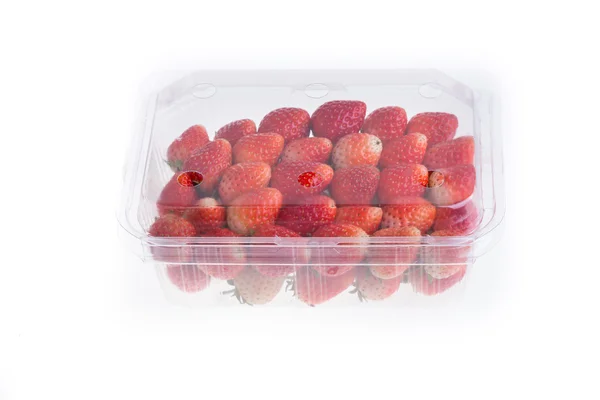 Red ripe strawberry in plastic box of packaging — Stock Photo, Image