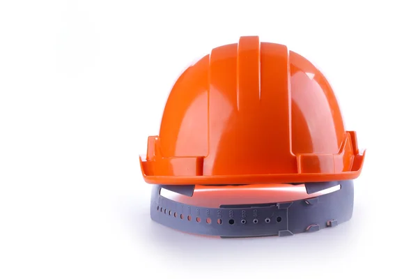 Pomarańczowy bezpieczeństwo kask twardy kapelusz, narzędzie ochrony pracownika o niebezpieczeństwie — Zdjęcie stockowe