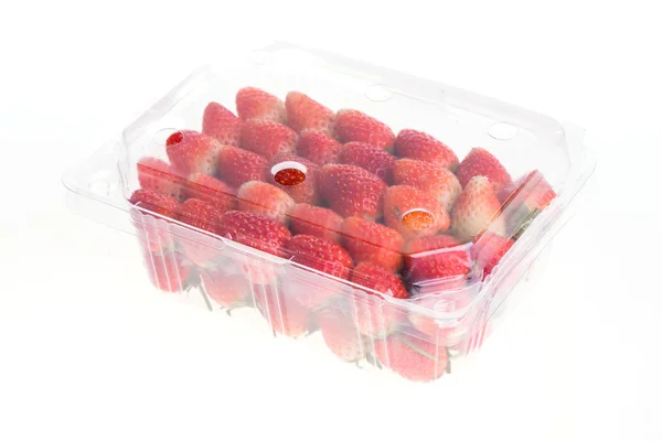Red ripe strawberry in plastic box of packaging — Stock Photo, Image
