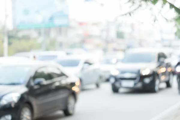 Car driving on road with traffic jam in the city — Stock Photo, Image