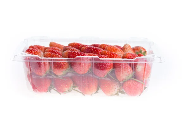 Red ripe strawberry in plastic box of packaging — Stock Photo, Image