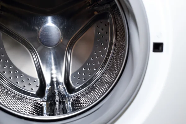 Крупним планом зображення пральної машини, абстрактна металева текстура — стокове фото