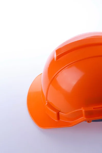 Casco di sicurezza arancione cappello rigido, strumento proteggere il lavoratore — Foto Stock