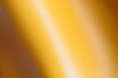 Tasarım için parlak sarı deri doku arkaplanı