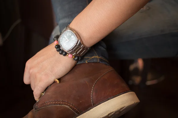 Brown boot leather shoes and jean pants clothing fashion of man — Stock Photo, Image