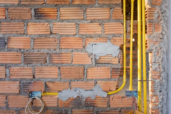 Brick wall in residential house building construction site — Stock Photo, Image