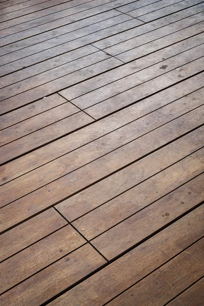 Imagem de close-up de piso de madeira envelhecido no edifício — Fotografia de Stock