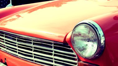 yakın çekim Far renkli klasik otomobil, görüntü filtresi vintage kullanılan.