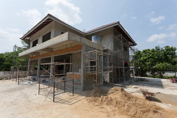 Building residential construction house with scaffold steel — Stock Photo, Image