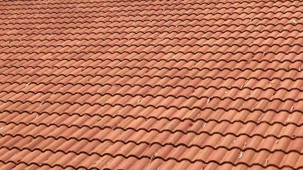 Brown tile roof weathered on building residential — Stock Photo, Image