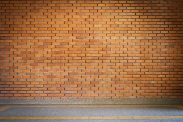 Backsteinmauer Textur Hintergrund und kleine Kiessteine gewaschen — Stockfoto