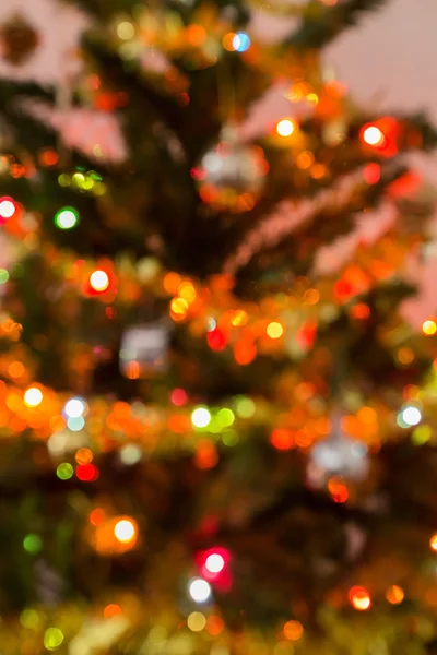 Celebração de luz borrão na árvore de natal — Fotografia de Stock