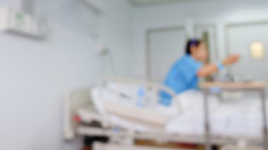 hasta yatağında oturmuş, görüntü bulanıklığı hastane arka plan