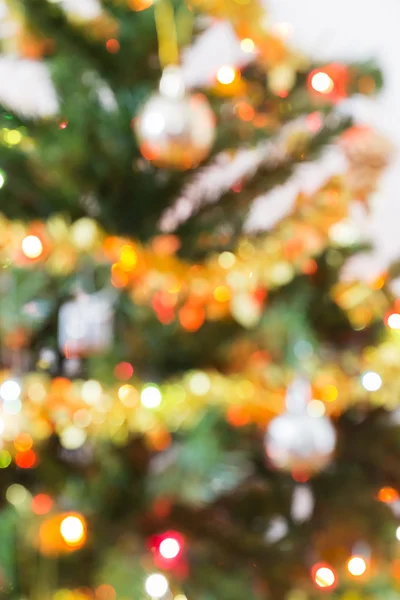 Celebração de luz borrão na árvore de natal — Fotografia de Stock