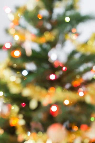 Lichtverschwommene Feier am Weihnachtsbaum — Stockfoto