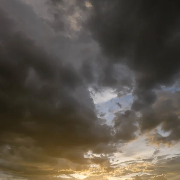 black cloud on sunset dramatic dark sky background