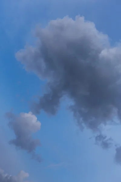 black cloud on blue sky