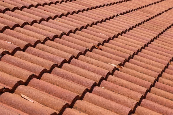 Brown tile roof weathered on building residential — Stock Photo, Image