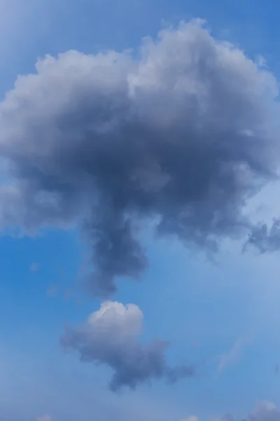 black cloud on blue sky