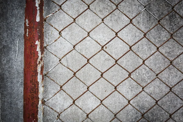 Zardzewiały drutami z cementu ściany tło grunge — Zdjęcie stockowe