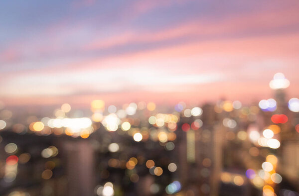 Bokeh light and blur city skyline sunrise background. Bangkok, Thailand, Asia