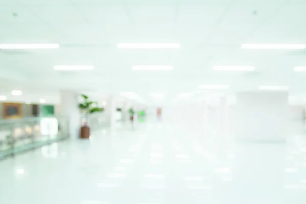 Blurred clean white floor office of hospital interior background