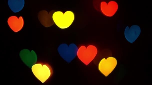 Coeurs lumineux se déplacent vers le haut fond de lumière 