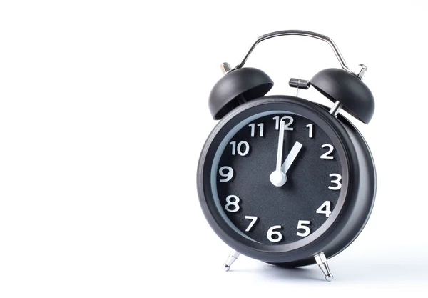 Relógio de alarme duplo sino preto no fundo branco — Fotografia de Stock