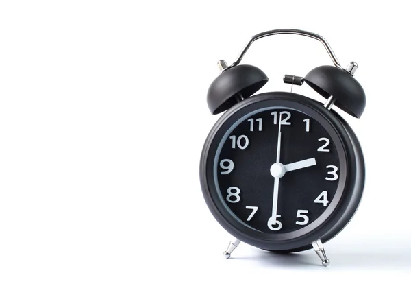 Zwarte dubbele bell alarm clock op witte achtergrond — Stockfoto