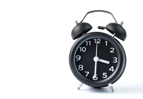 Relógio de alarme duplo sino preto no fundo branco — Fotografia de Stock