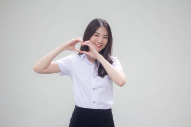 Taylandlı yetişkin üniversite üniforması güzel kız kalbini verir.