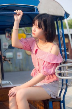 Asia Thai Teen Pembe tişört Güzel kız gülümse ve rahatla